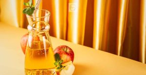 Apple juice is processed by centrifugation to remove starch and pectin, retaining fine particles in suspension